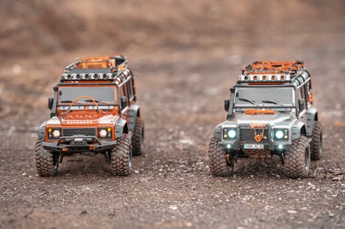 ATV car parked on rough stony terrain · Free Stock Photo