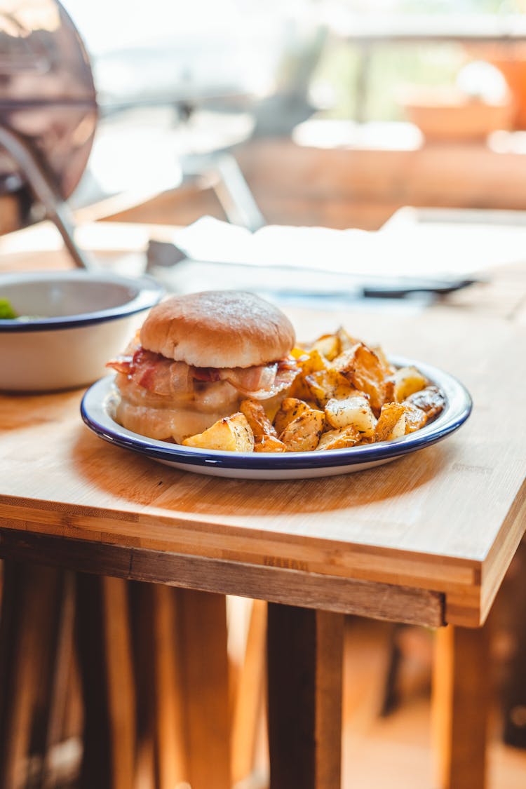 Delicious Burger With Roasted Potato Wedges