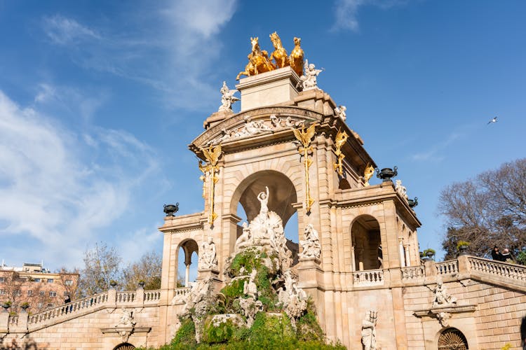 Old Monuments With Bronze Statues In Park