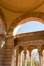Arched passage with columns in aged building