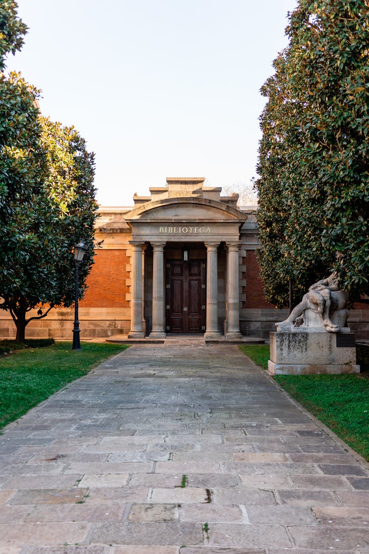 Old Stone Building With Marble Columns In Garden