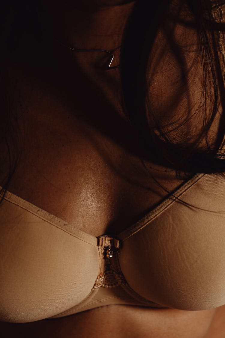 Person Wearing Beige Brassiere