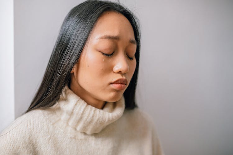 Close Up Photo Of A Woman Crying