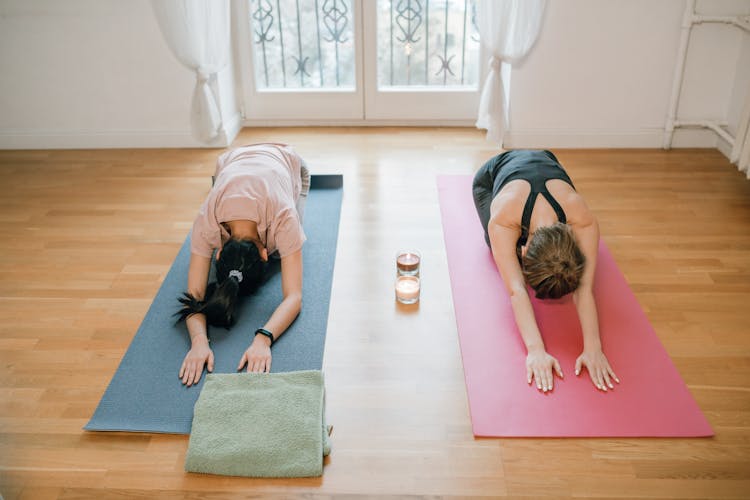 Two Women Doing Yoga Pose