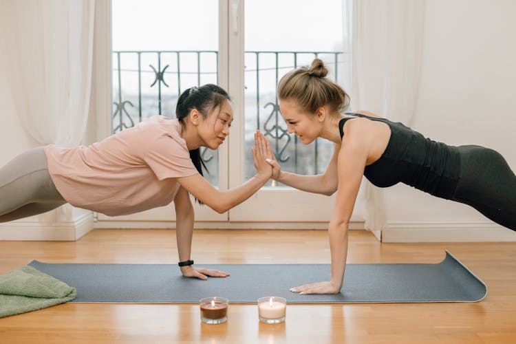 Two Women Doing Yoga Pose