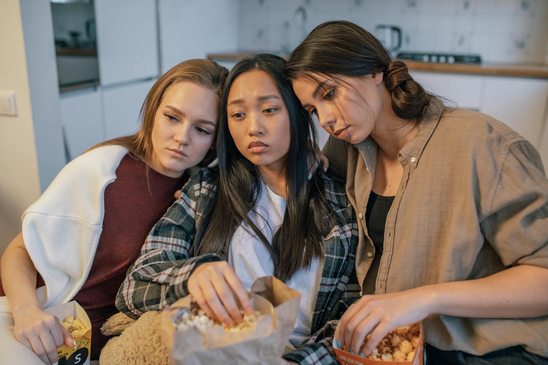 A Group of Friends Eating Popcorn Together