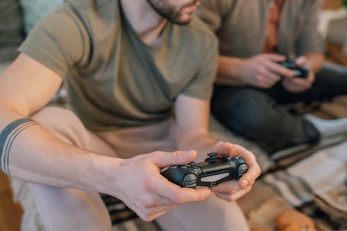 Photo of Person holding a Gamepad