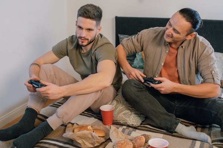 Photograph Of Men Playing Together