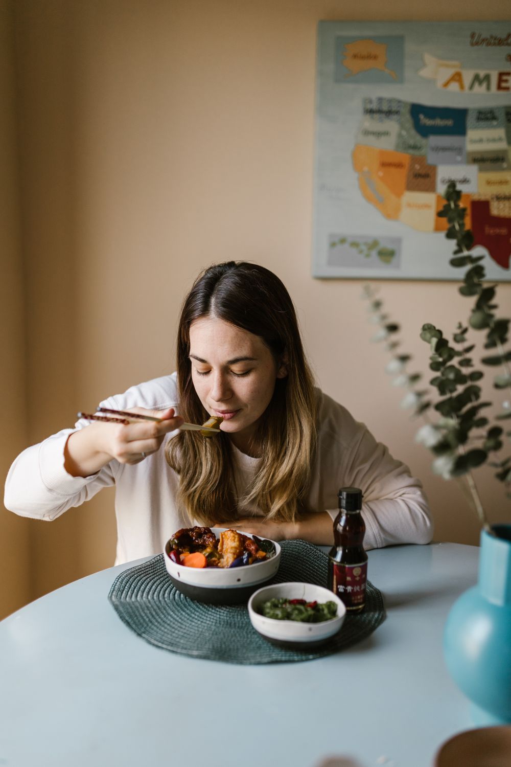 Eatingt Table A Woman Eating at the Table · Free Stock Photo