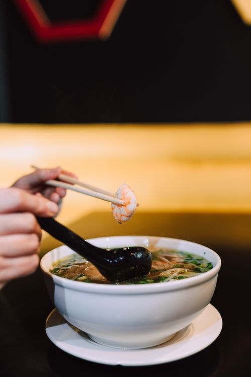 A Person Holding a Spoon · Free Stock Photo