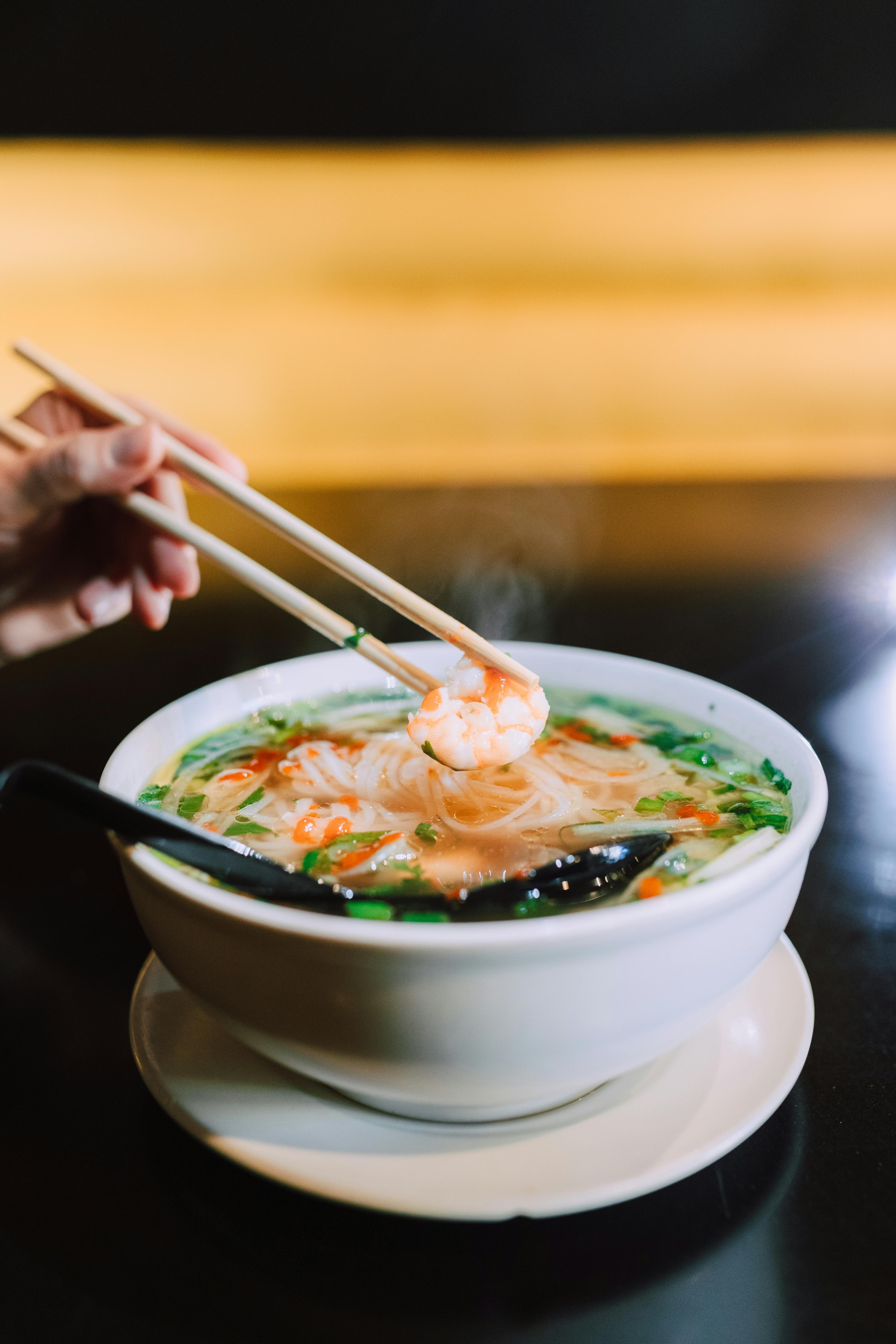 Fresh gourmet noodle soup, ready to eat with chopsticks generated by AI  24561213 Stock Photo at Vecteezy