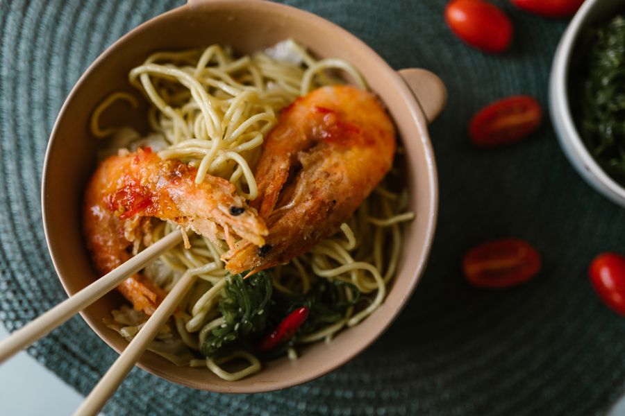 Spicy Asian soup with vegetables and traditional herbs