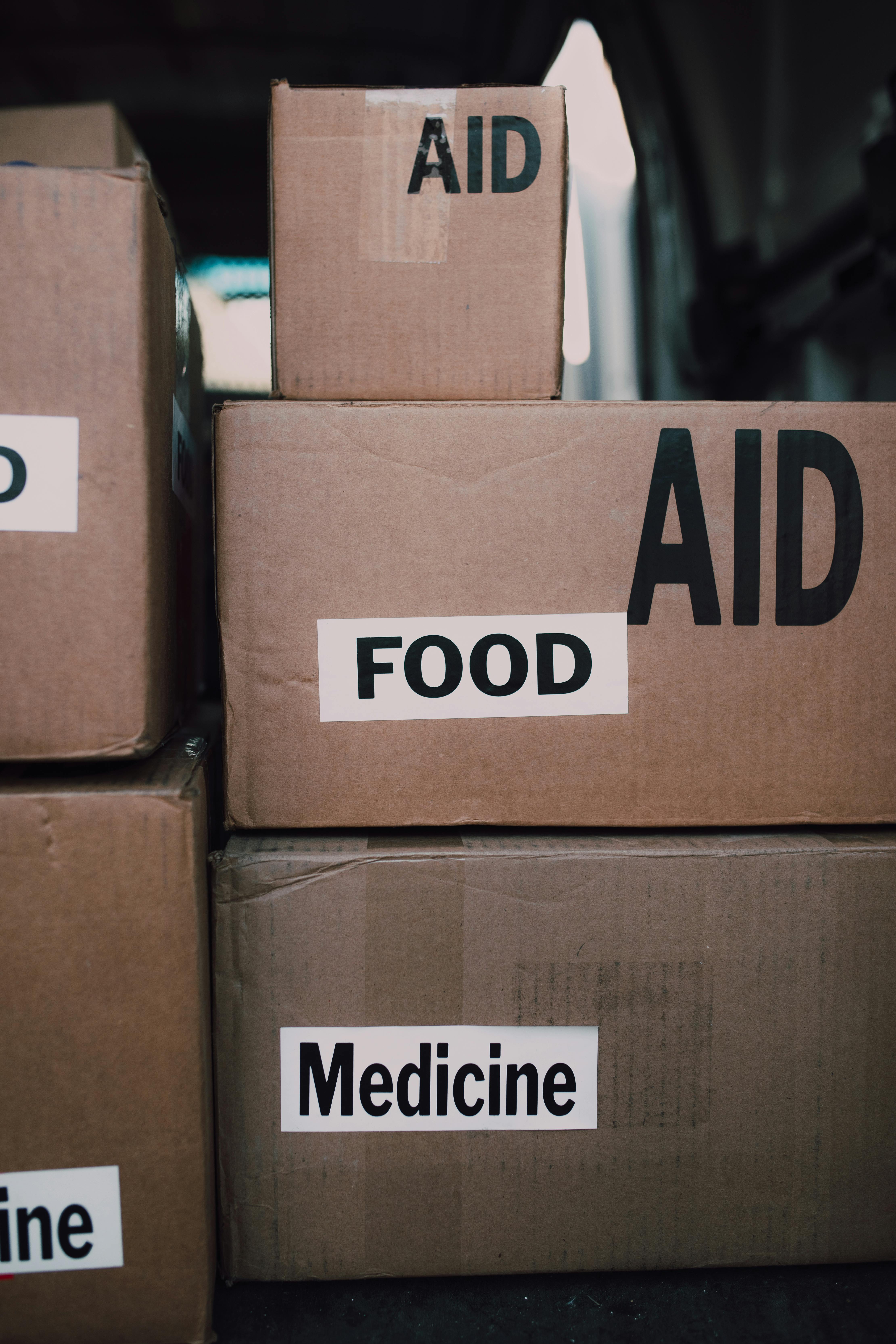 brown cardboard box with white and black label