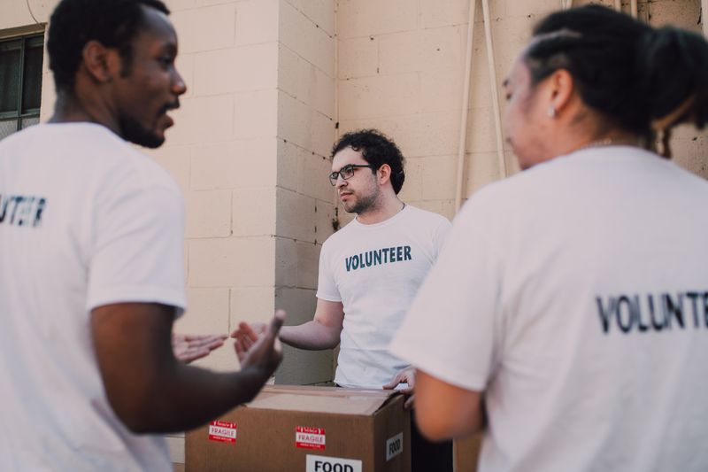 Group of volunteers organizing food donations
