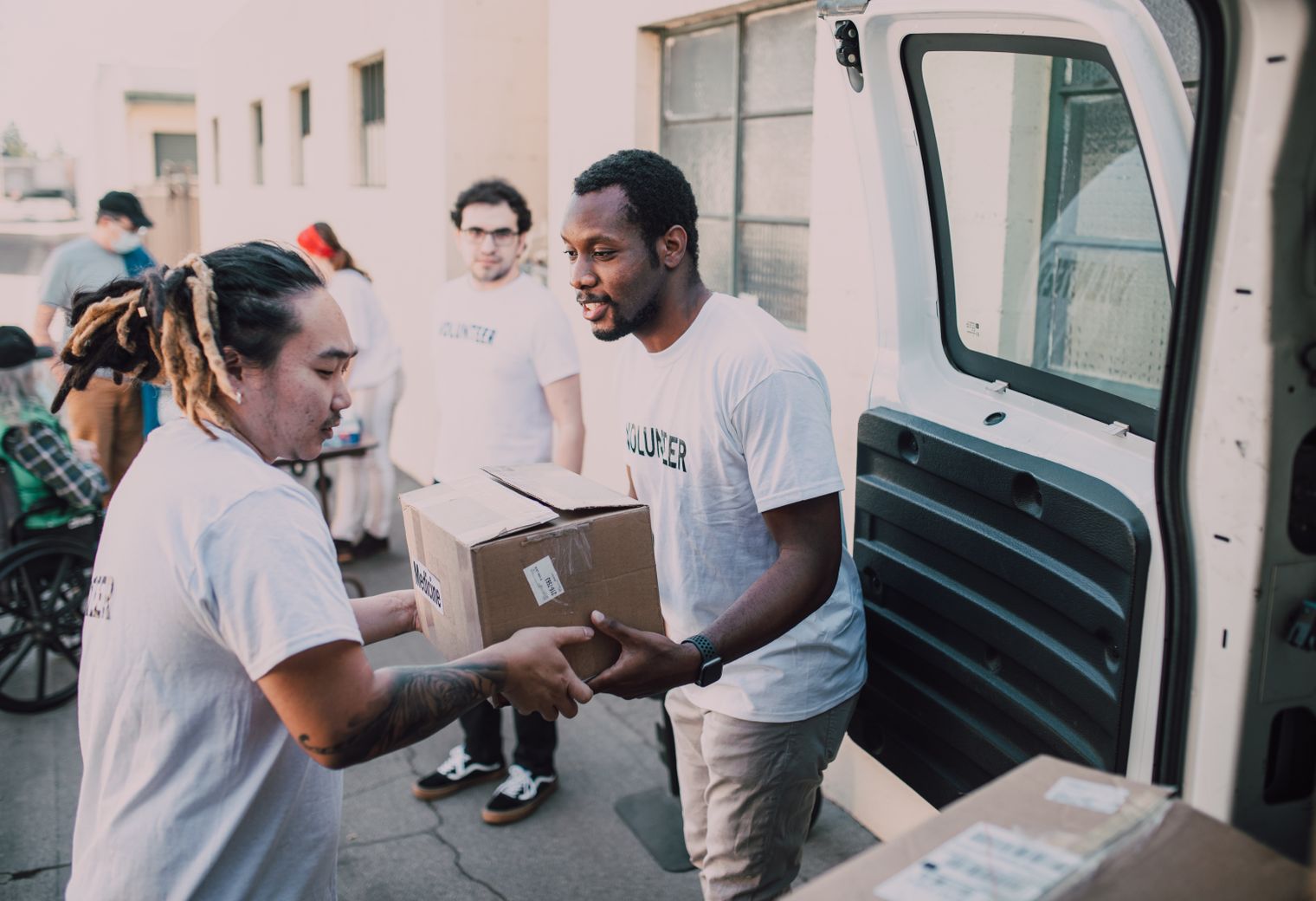 Langley — house clearance team loading furniture into a van