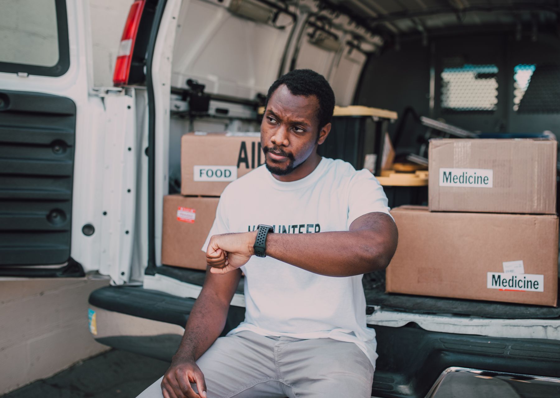Same day removals in Donnington — crew wrapping and loading on moving day