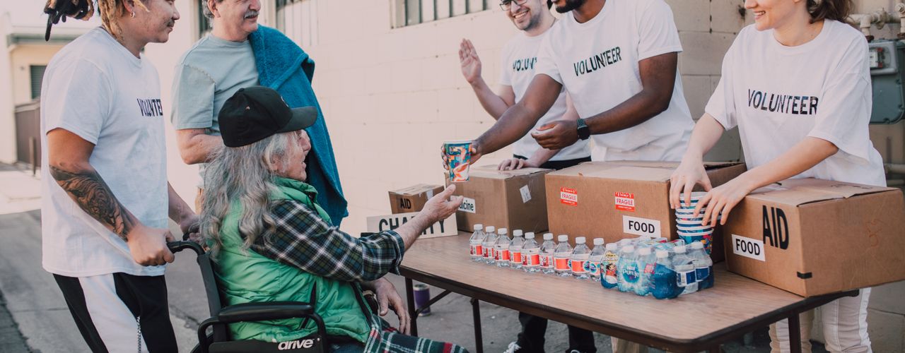 Volunteers working together at a community service event