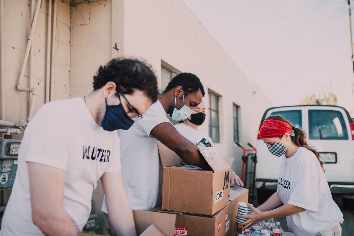 Corporate volunteers in a community workshop