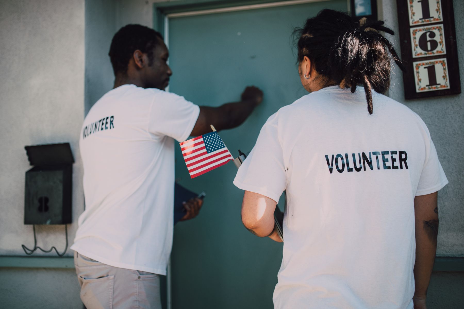 Volunteers packing essential goods with care and attention