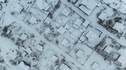 Houses on Snow Covered Ground