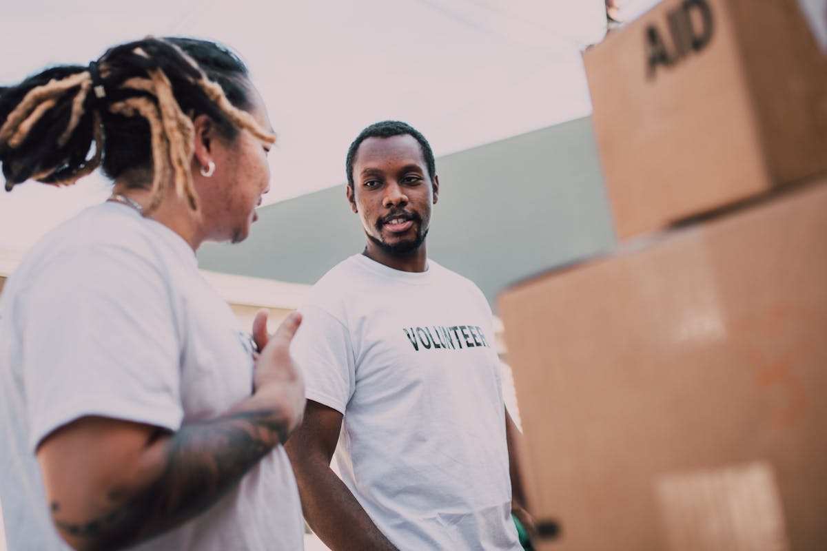 Caregiver sitting with a counselor discussing emotional support