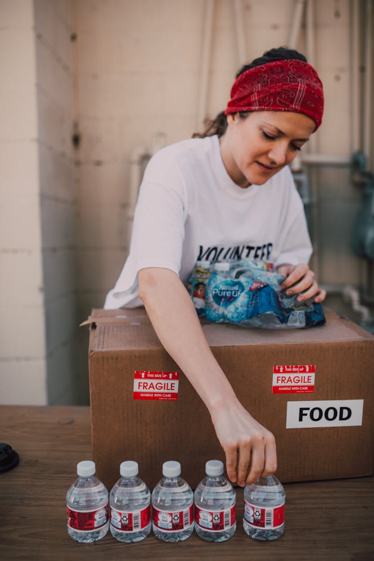 Woman Holding Bottled Water