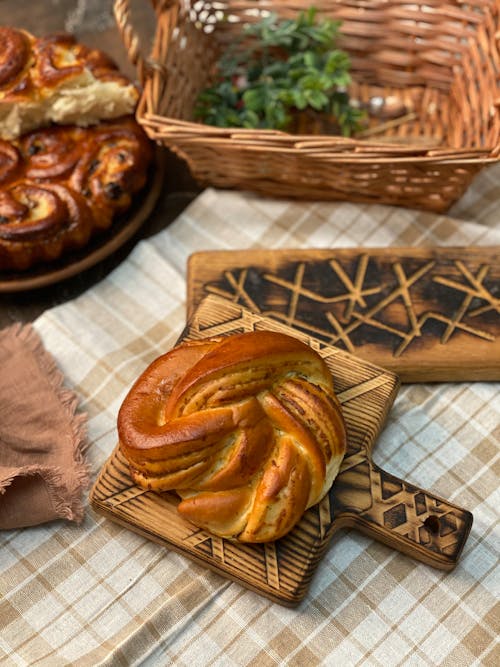 Free Freshly Baked Bread on a Wooden Platter Stock Photo