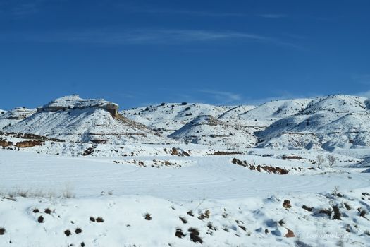 Winter Landscape With Hills
