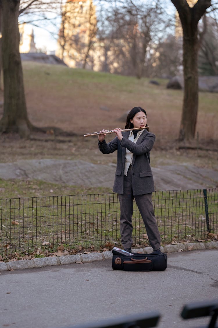 A Woman Playing Flute