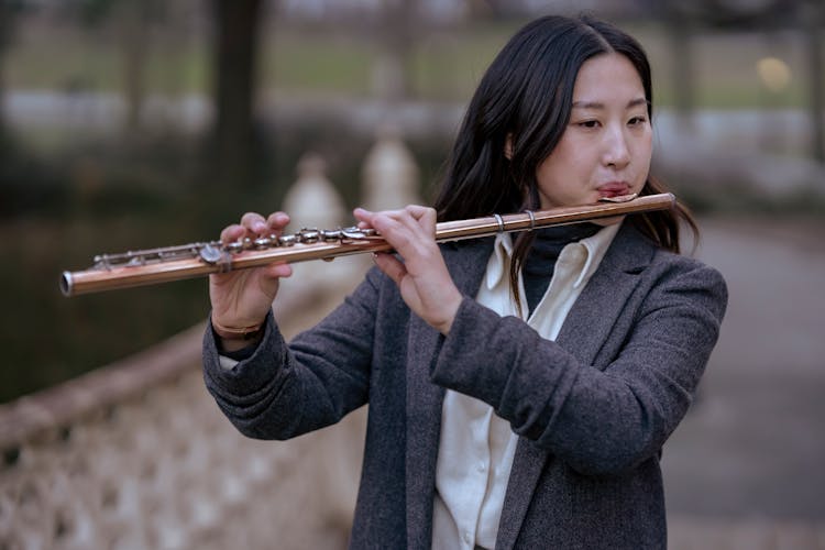 A Woman Playing Flute