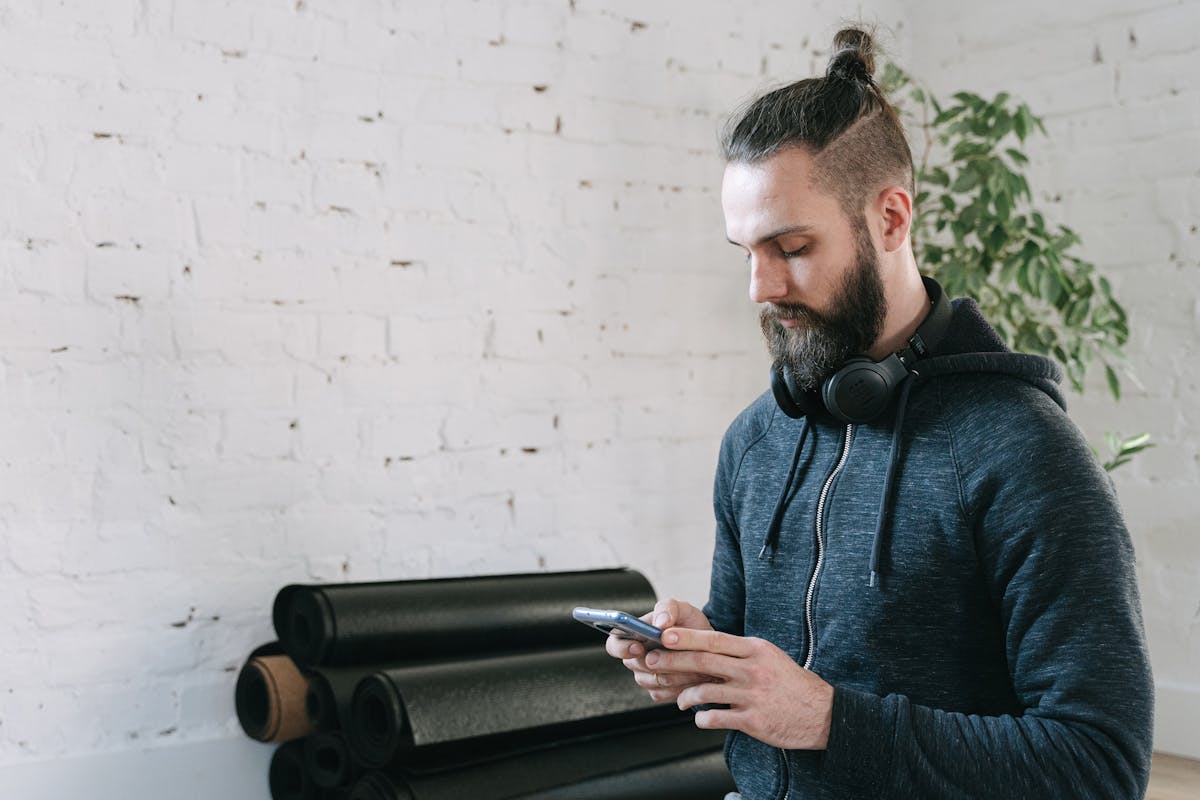 Mediterranean bowls on a table with hands reaching in to share