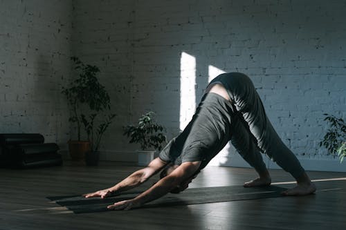 Free A Man Doing Yoga Stock Photo