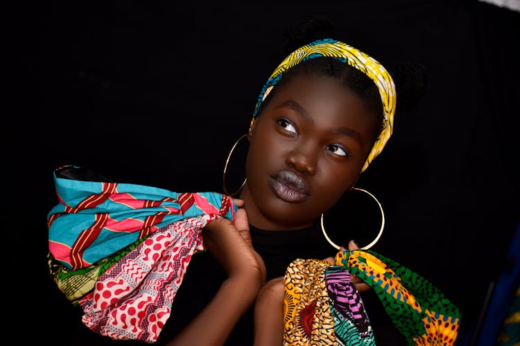 Girl Holding Headbands