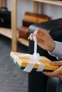 A Person Holding a Gift