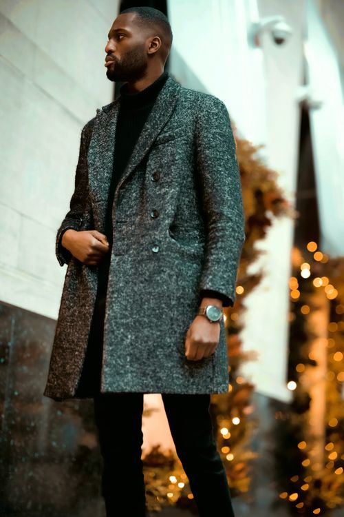 Free Stylish African American man in a winter coat standing outdoors, Ottawa Stock Photo