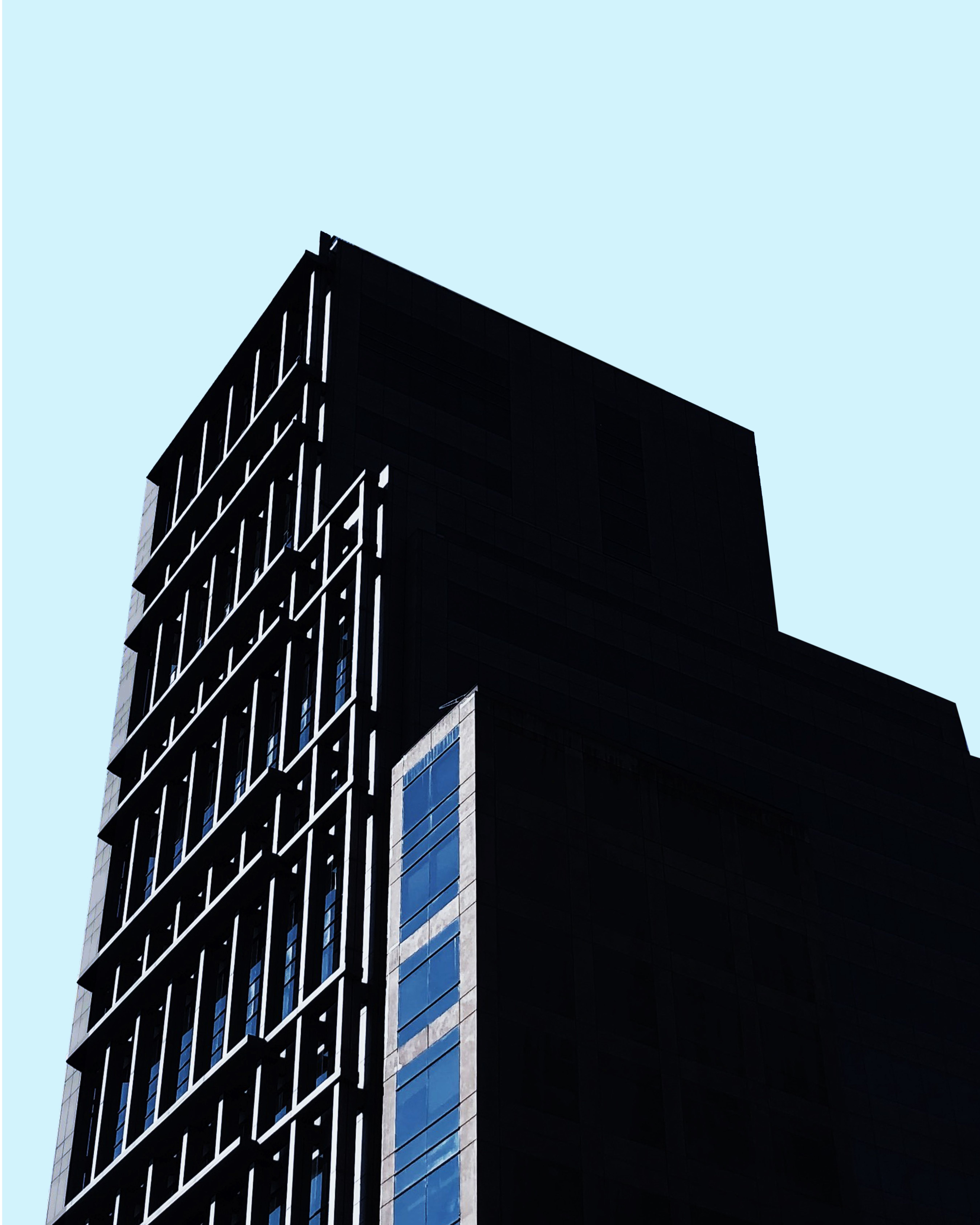 Photograph of a Building Under a Blue Sky · Free Stock Photo