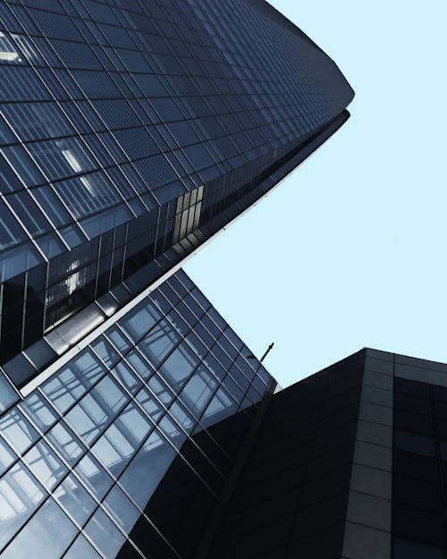 Low-Angle Shot of Buildings with Glass Windows