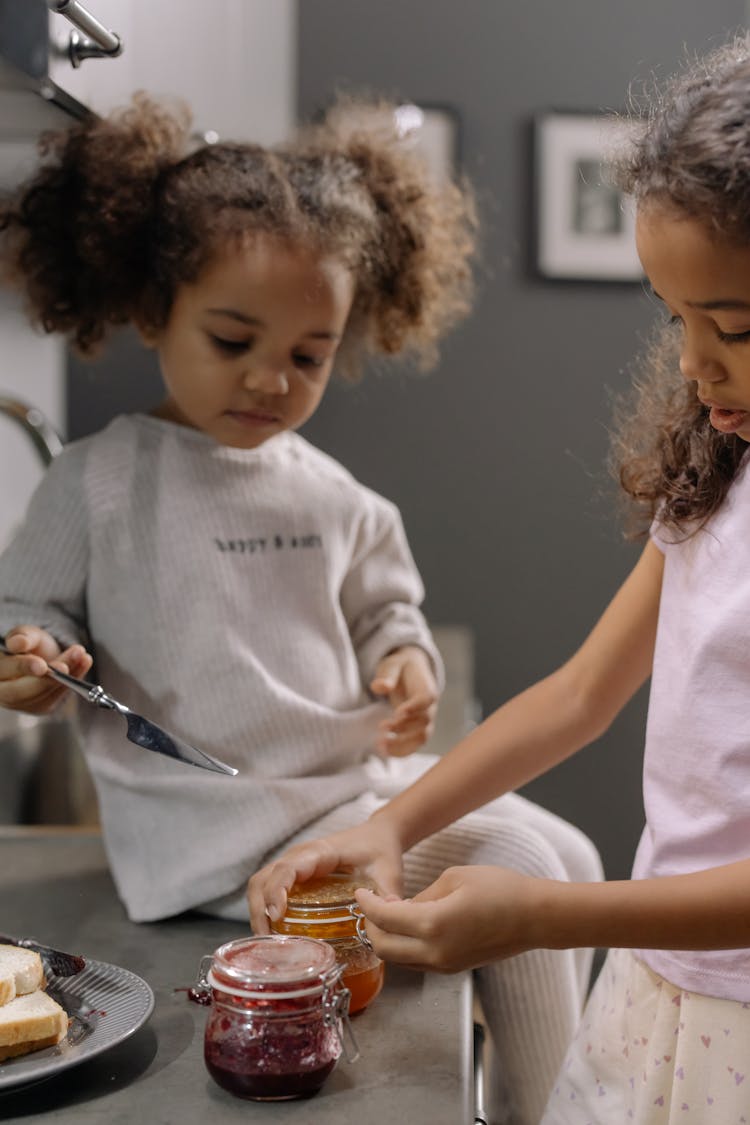 Children Opening A Jar