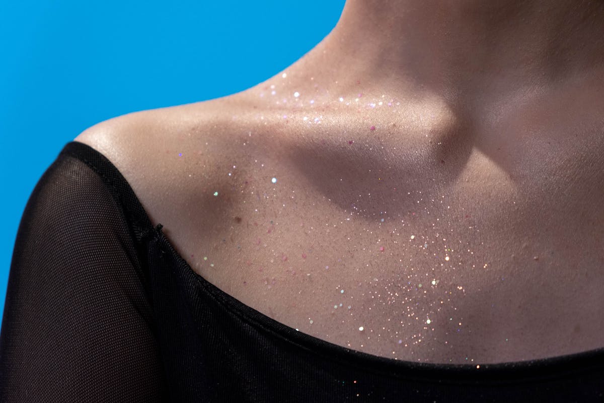 Photograph of a Woman's Chest with Glitter
