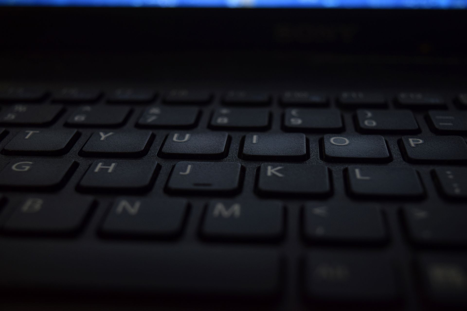 Turned on Black Laptop Computer
