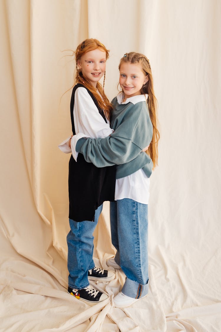 Young Girls Hugging Each Other