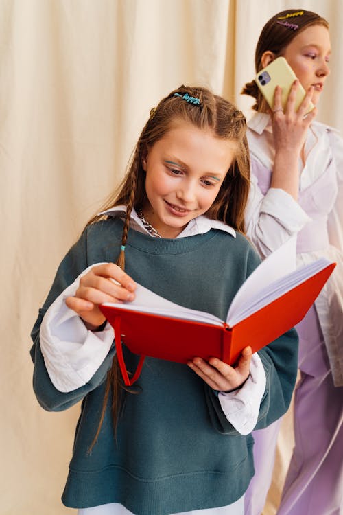 Free Girl Reading a Book Stock Photo