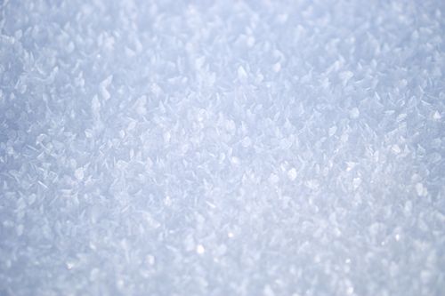 Free Textured close-up of delicate sparkling ice crystals evoke winter's beauty. Stock Photo