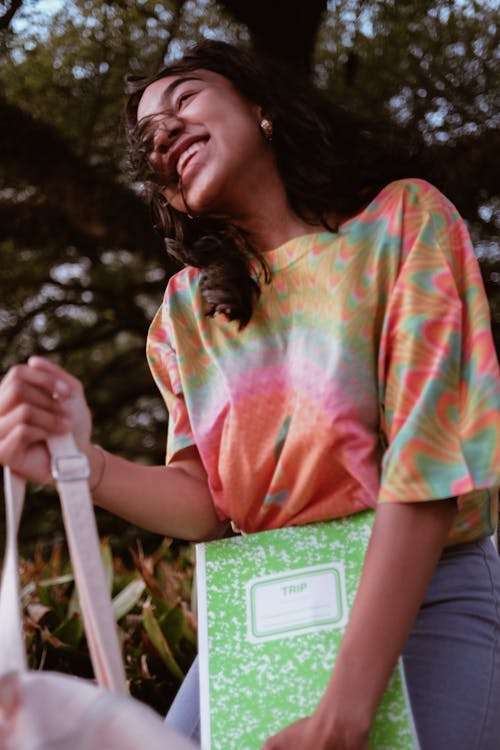 A Young Woman in a Tie Dye Shirt