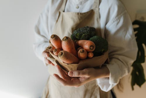 Free Close-Up Shot of a Person Holding Assorted Vegetables Stock Photo