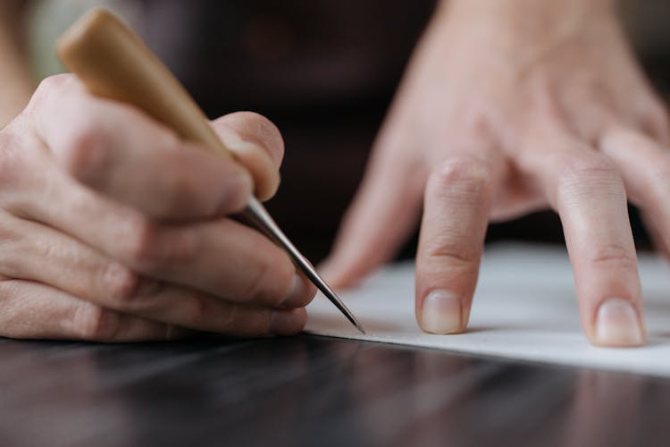 Man Hands Marking On Paper