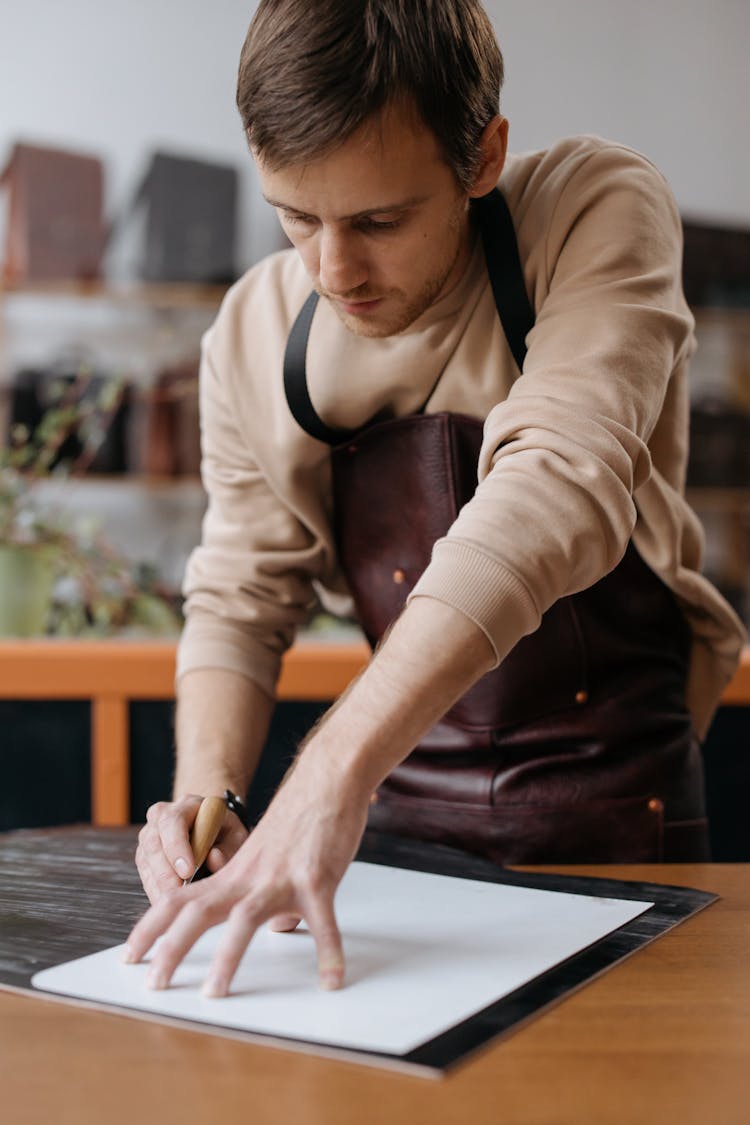 Man Wearing A Leather Apron