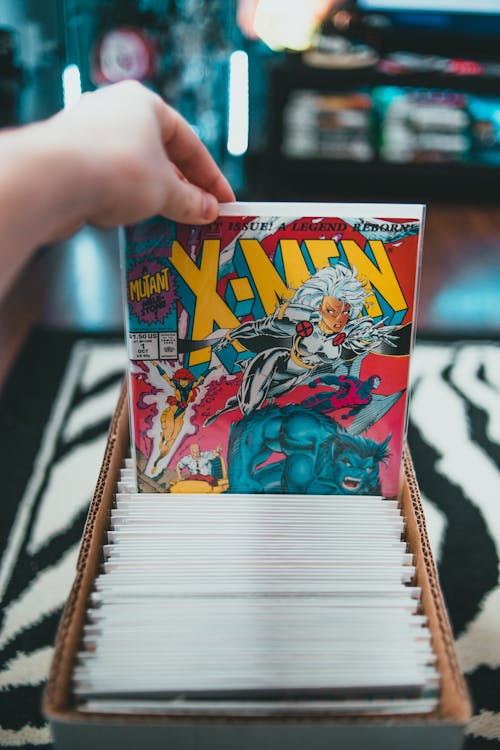 Free Collection of various comic books in box Stock Photo