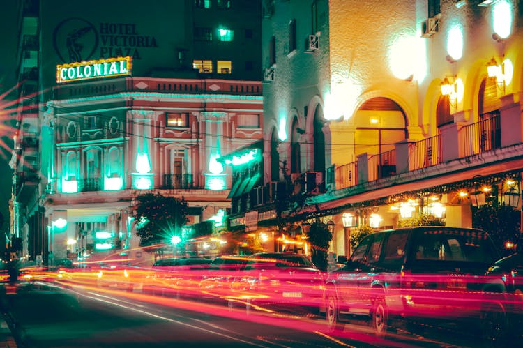 Neon Light Streaks On The Street During Night Time