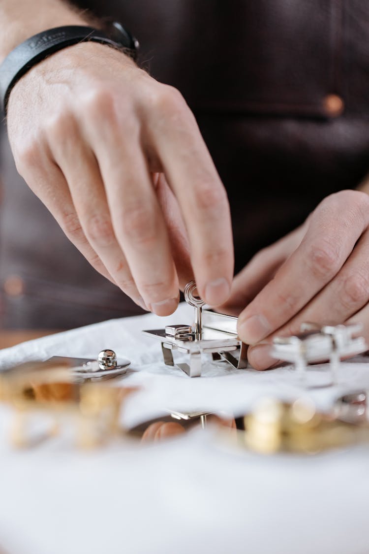 A Person Locking The Stainless Screw